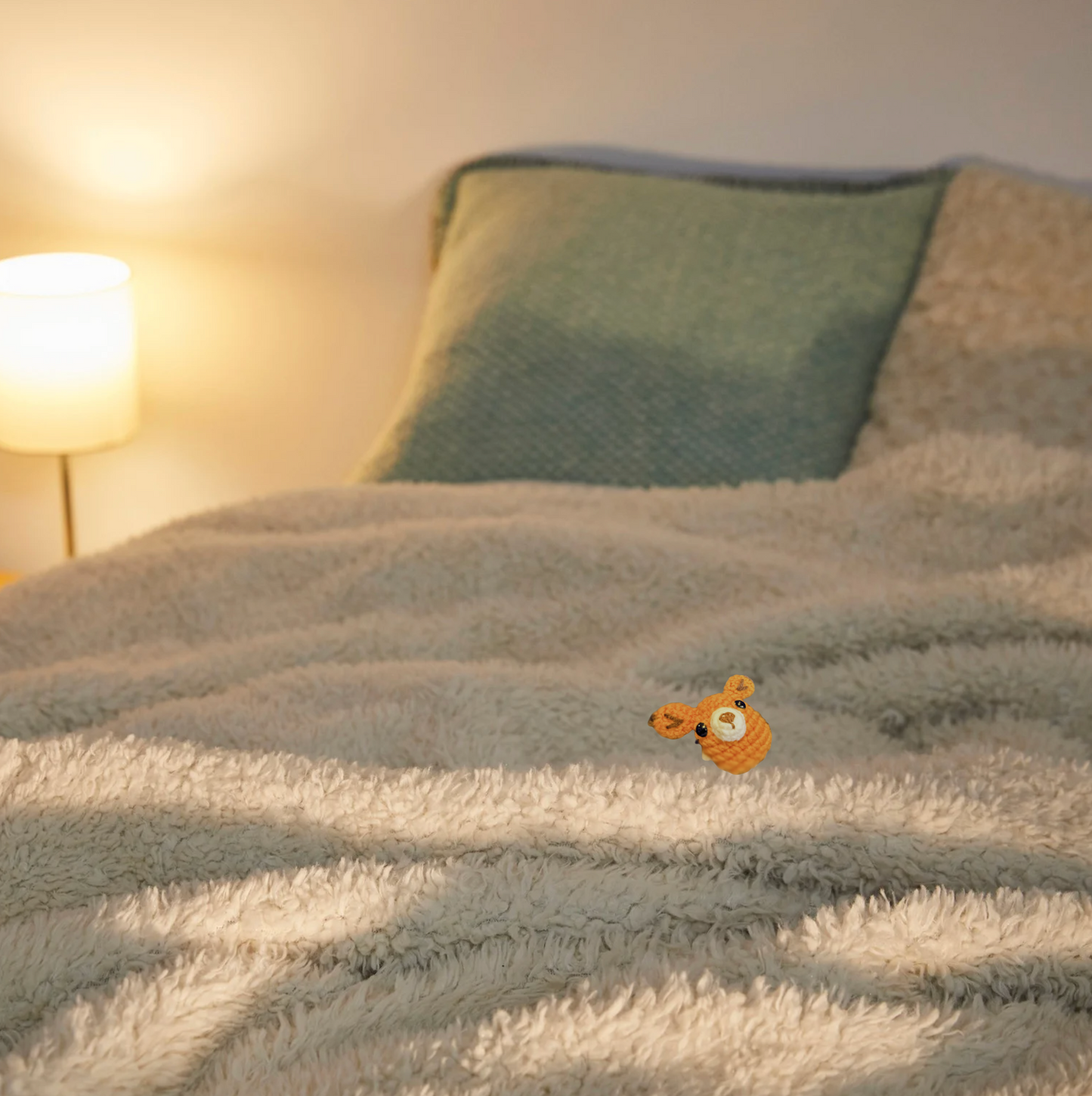 Lifestyle photo of TJ the Fox, a handmade Chunkle Puff catnip toy by Feline Grove. Shown in a refined interior with soft linen backdrop, presenting his fox design as a luxury woodland-inspired piece for elegant homes.