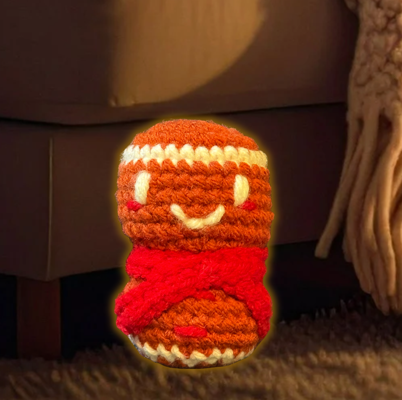 Knitted gingerbread girl cat toy to represent Luxury Chunkle catnip toy from Minou Le-Mew, scented with Miracle Nip botanicals.
