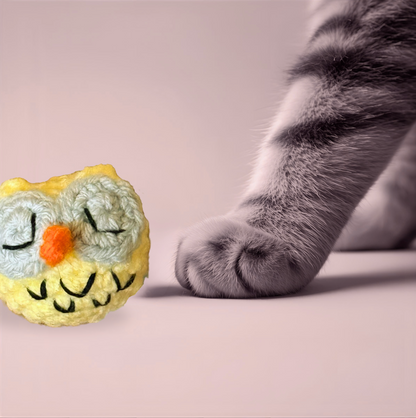 Detail image of Yolk the Owl, a handmade Chunkle Puff catnip toy by Feline Grove. Multiple angles show his tightly woven round form, stitching, and owl-inspired design, emphasizing boutique quality and refinement.