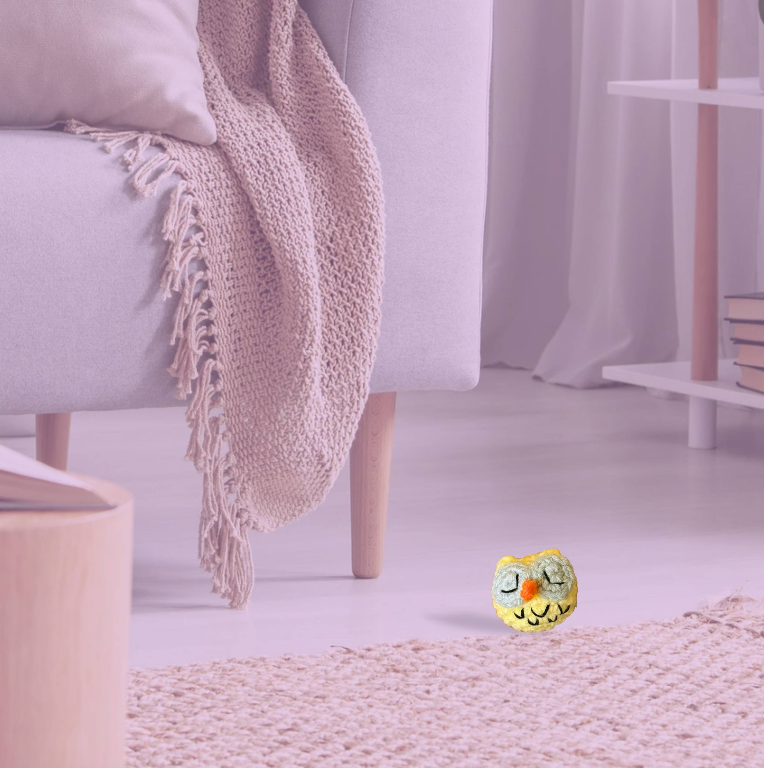 Yolk the Owl, a handmade Chunkle Puff catnip toy measuring approx. 2 inches round, shown beside a familiar object for scale. Woven owl-inspired form highlights petite size and luxury craftsmanship.