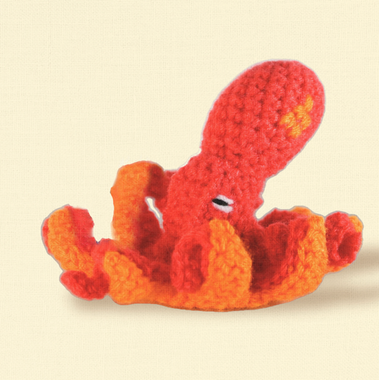 Julie the Kraken, a 6 inch handmade Chunkle Puff catnip toy by Minou Le-Mew, shown alone on a neutral background. Octopus-inspired form highlights boutique craftsmanship.”